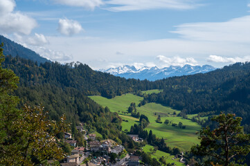 Naklejka premium Aerial View alp mountains In South Tyrol region in Italy with a village in the valey.