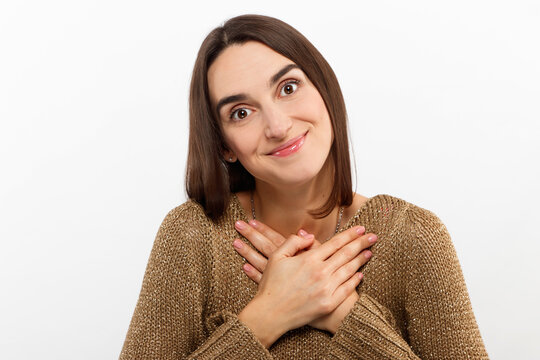 Cheerful happy young beautiful girl looking at camera smiling laughing over white background.