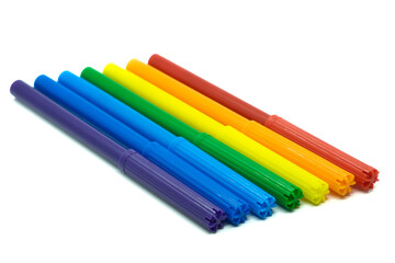 Colored felt-tip pens isolated on white background. Colored markers on white. Drawing concept.