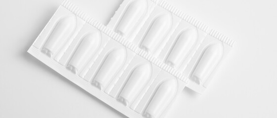 Suppositories for anal or vaginal use on a white background medication.