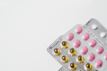Medicine pills packaging background on white background
