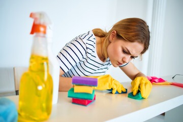 Woman cleans sponge table household cleaning service lifestyle