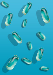 Falling transparent fish oil pills on different planes against a blue uniform background. Vitamins and pills.