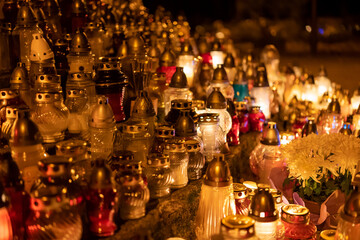Candles on the grave. Cemetery.