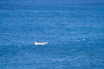 FIshing boat on the blue ocean