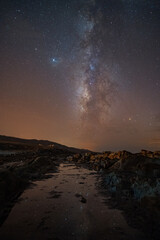 Milky way reflected in a sea puddle © Nelson