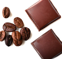 pieces of chocolate and roasted coffee beans isolated on white. flat lay