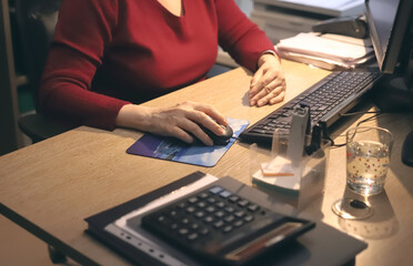 female hands with mouse keyboard and computer. Workspace