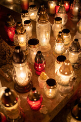 Candles on the grave. Cemetery.