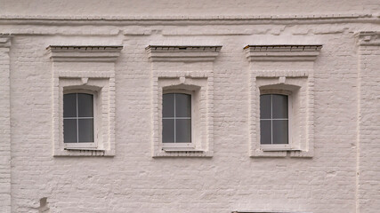 Windows in a brick wall