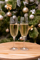 glasses of champagne and christmas tree