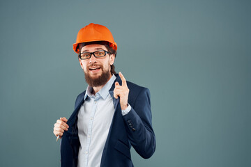 man in orange suit hard hat engineer construction work lifestyle official