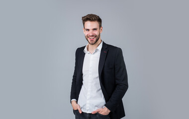 Fashion is his life. Businessman in suit. Young handsome man. Young manager in his office. portrait...