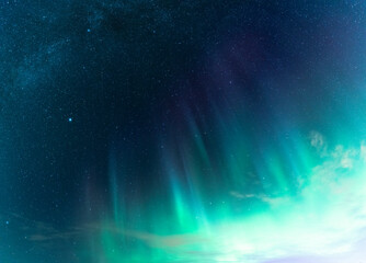 Amazing panorama of Scenic Aurora Borealis stripes glow under Milky Way stars and galaxies, photo...