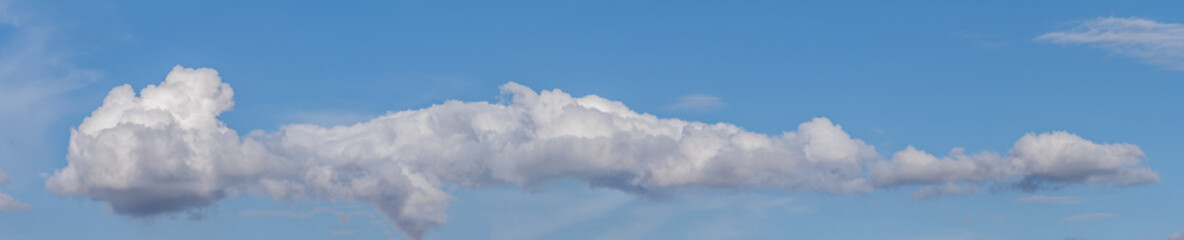 clouds in the sky making shapes, figures and drawings of various colours