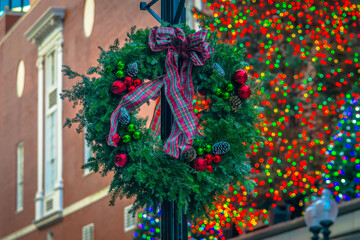 A Christmas wreath on a city lantern