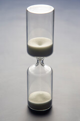 Hourglass. Time is money. Business solutions in time.