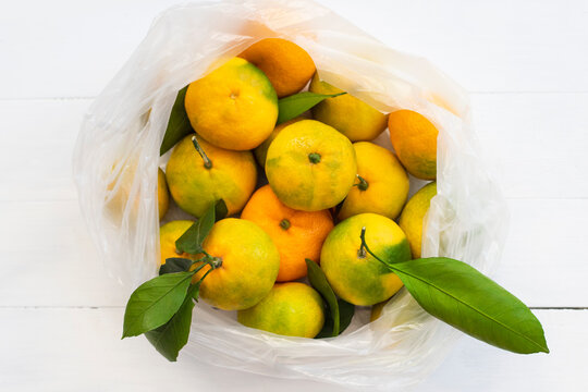 tangerines on a white table