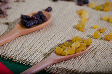 wooden spoons with raisins and chocolate. Christmas table