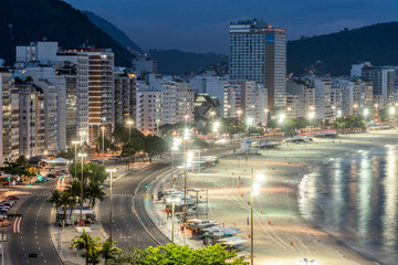 Beautiful view to Copacabana Beach and ocean on the sunrise blue hour