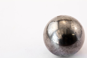 Close up of small rusted ball bearing