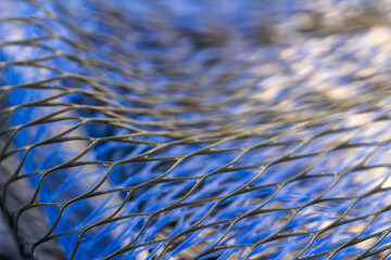 Close up of blue and gray nylon mesh
