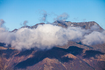 Caucasian Mountains. View from a vantage point 2200 m in height on Krasnaya Polyana in Krasnodar Territory, Russia
