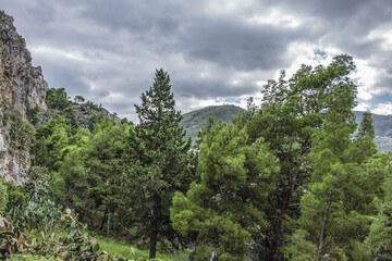 Obraz premium Wonderful scenery of the Rocca Mountain. La Rocca Mountain dominates the silhouette of Cefalu. Province of Palermo, Cefalu, Sicily, Italy.