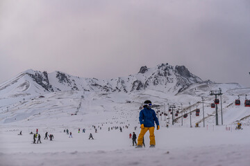 People skiing in Erciyes ski resort. Snowy Mount Erciyes