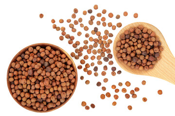 Carlin peas healthy food in a wooden spoon, bowl & loose on white background. Very high in protein, low in fat, high in fibre, antioxidants & anthocyanins with low GI. Flat lay, top view.