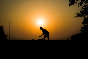 silhouette of a person during sunset
