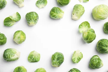 Foto op Plexiglas Fresh Brussels sprouts on white background, top view. Space for text © New Africa