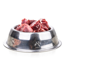 Serving of raw barf beef meat chunk for dog meal
