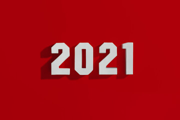 White volumetric paper numbers papercraft 2021 on a red background