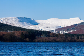 View of beautiful snow covered mountains on a crisp, winters day