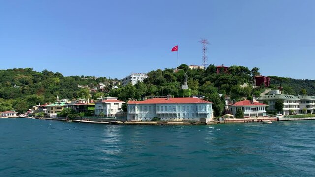 Footage of Anadolu hisari / Kandilli area of Istanbul by Bosphorus. Beautiful scene. It is a sunny summer day. Camera moves forward.