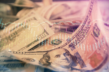 Double exposure of forex graph drawing over us dollars bill background. Concept of financial markets.