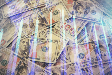 Multi exposure of forex chart drawing over us dollars bill background. Concept of financial success markets.