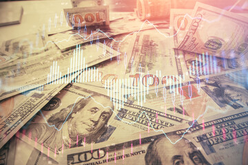 Multi exposure of forex chart drawing over us dollars bill background. Concept of financial success markets.