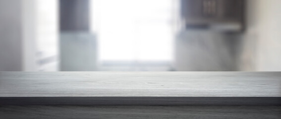 Background - modern wooden table, in the kitchen of a beautiful home