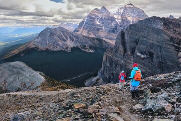 Group of people hiking the mountains. Banff National Park. Canada 