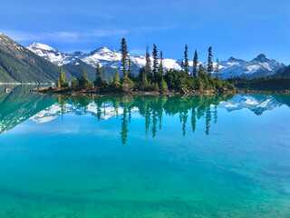 Alpine lake with snow covered mountains and reflections. Garibladi Lake. Whistler. British Columbia. Canada 
