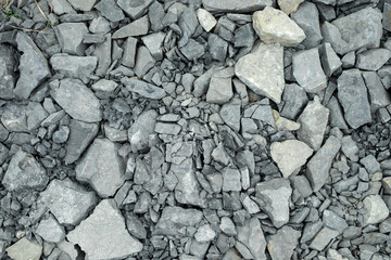 Crushed stone. Gravel texture or gravel background. Closeup pile of crushed gravel texture
