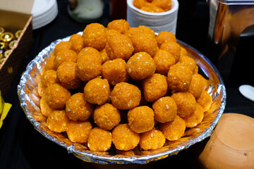 Sweet Indian desserts in ball-shape in silver cup