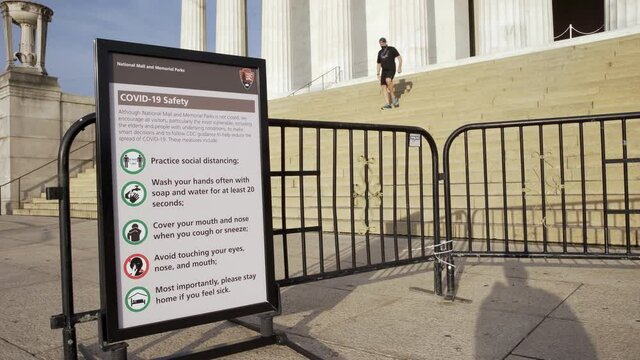 Covid 19 Safety Sign Outside Lincoln Memorial