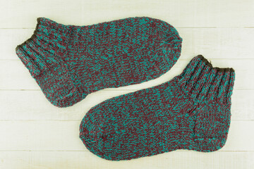 Warm and beautiful socks knitted of woolen threads
