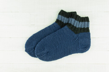 Warm and beautiful socks knitted of woolen threads