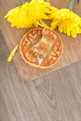 Looking down and shooting moon cakes and chrysanthemums on a cutting board