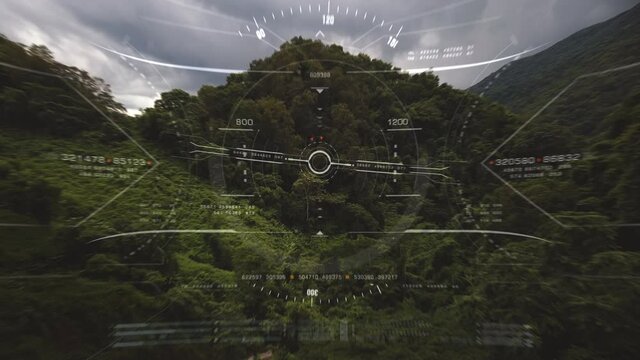 Aerial view from the fighter plane's cockpit flying in the dense tropical forrest canyon mountain with head up display acquire targets and enemies location hidden in the dense mountain forest