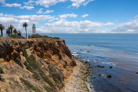 View of Point Vincente lighthouse with cloudy sky in Rancho Palos Verdes, California.